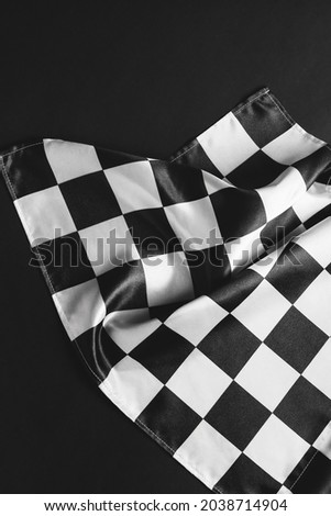 Racing flag on dark background