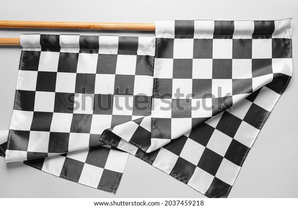 Racing flags on light
background