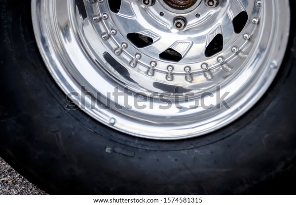 racing wheel. chrome wheel of a racing car.
car racing concept. shabby racing
tire