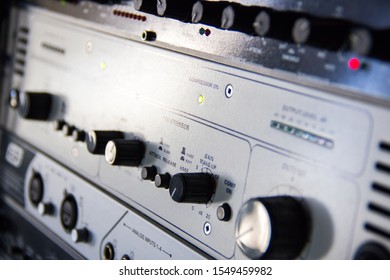 A Rack Of Audio Compressors And Other Components Of Sound Reinforcement System In A Recording Studio Close Up. Making Music In The Professional Studio