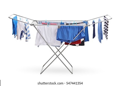 Rack dryer with clothes hanging isolated on white background