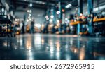 A rack of dumbbells in sharp focus in the foreground, with a blurred background showing the interior of a brightly lit gym filled with various exercise equip...
