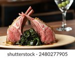 Rack of Lamb - Lamb Lollipops Served with Steamed Greens and a Martini with 3 Olives