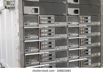 Rack mounted chassis with blade servers background - Shutterstock ID 268823681