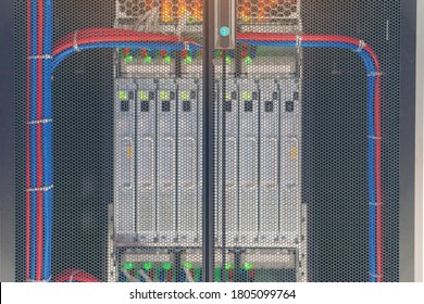 Rack Mounted Servers In A Server Room, Server Rack Audio Cable. Severs Computer In A Rack At The Large Data Center. 