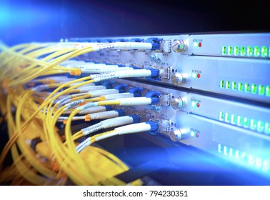 Rack Mounted Servers In A Server Room, Server rack audio cable. Severs computer in a rack at the large data center. Fiber Optical connector interface for Cards Equipment DWDM telecommunications