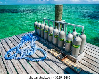 A Rack Of Nitrox Gas Sits On A Dive Dock