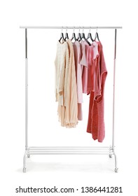 Rack with stylish clothes on white background - Shutterstock ID 1386441281