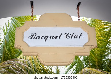 Racquet Club Sign Hanging In The Ceiling