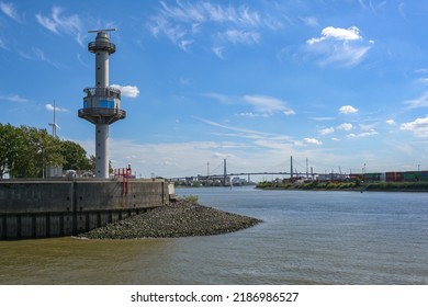 Radar Tower At The Steinwerder Coal Ship Harbor In The Cargo Port Of Hamburg, Koehlbrand Bridge Over The River Elbe In The Background, Blue Sky, Copy Space, Selected Focus, Narrow Depth Of Field