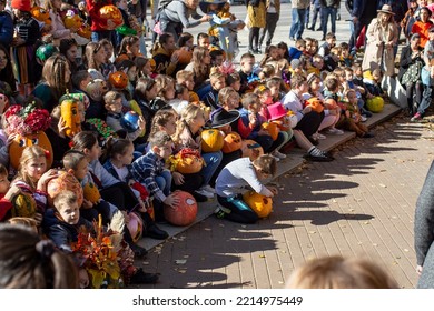 Radauti, Romania- 10 16 2022: Crowd Of Children At A Pumpkin Painting Contest Or Exibition