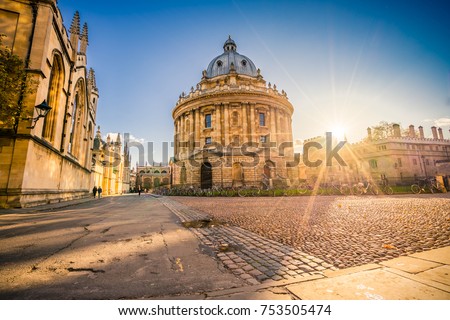 Radcliffe square with Science Library and sunset flare in Oxford, England 