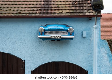 RADEBERG, GERMANY - November 16 2015: Car Breaks Through The Blue Wall