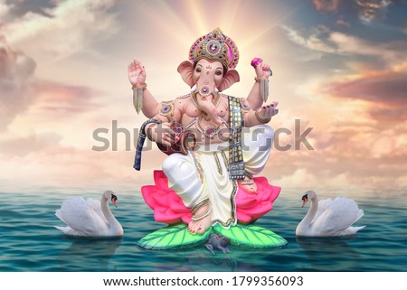 The radiant form of Ganapati on lotus flower. Ganpati festival