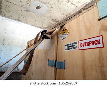 Radiation Warning Sign On The Hazardous Materials Transport Label Class 7 At The Wooden Box Package In The Container Of Transport Truck