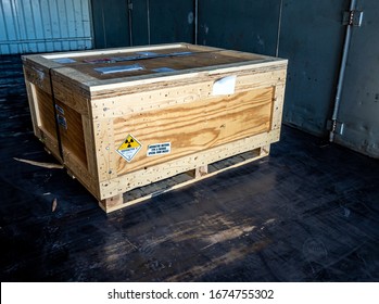 Radiation Warning Sign On The Hazardous Materials Transport Label Class 7 At The Wooden Box Type A Standard Package In The Container Of Transport Truck