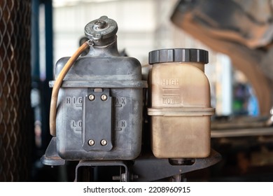 Radiator Coolant Water Containment Box Of The Heavy Truck Or Machinery Equipment. Industrial Object Photo, Close-up And Selective Focus.