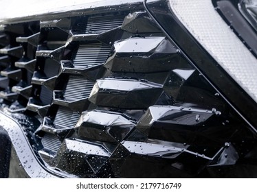 Radiator Grille Pattern. Car Radiator Grill Close Up With Water Drops. Chrome Grill Of Big Powerful Car Engine.