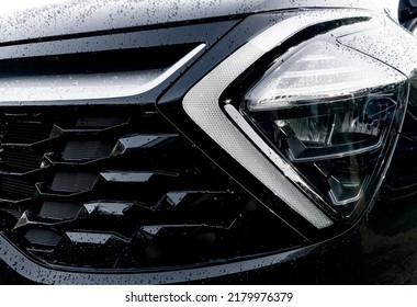 Radiator Grille Pattern. Car Radiator Grill Close Up With Water Drops. Chrome Grill Of Big Powerful Car Engine. Car Exterior Details