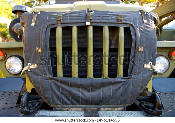 Radiator\
of a large military truck. Car radiator\
grille.