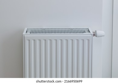 Radiator, Room Interior, White Painted Wall, Central Heating Installation, Warm Home. Concept Of The Need For Good Central Heating.