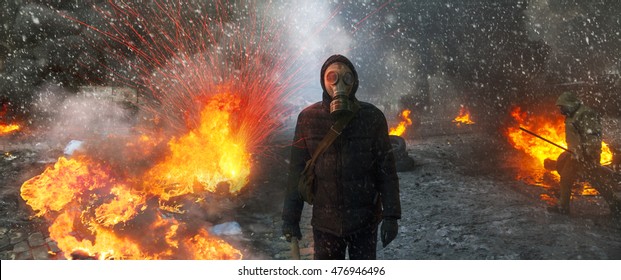 Radical Protestant in the mask represents the protesters against the authorities among the burning of the capital of the European quarter. Burning rubber tires wheel of fire smoke soot street fighting - Shutterstock ID 476946496