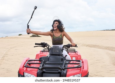 Radical Woman Filming And Riding An ATV