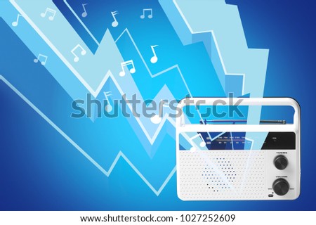 Radio broadcasting music on color background