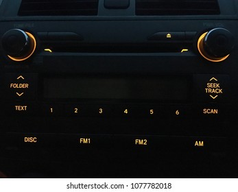 Radio button light in car.