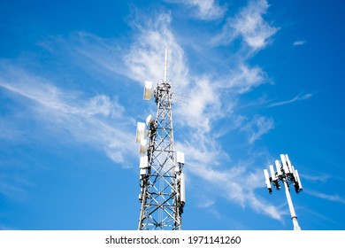 Radio, communication and cell towers on blue sky background. Australia