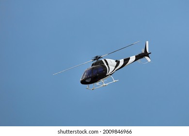 Radio Controlled Model Helicopter In Flight.