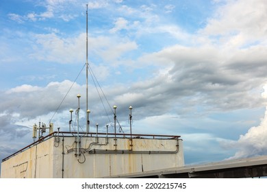 a radio mast on the roof, and solar panels on the roof
