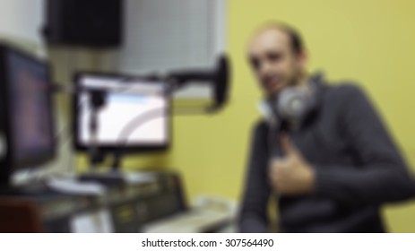 Radio Station ,radio Personality In The Office Blur Out Of Focus