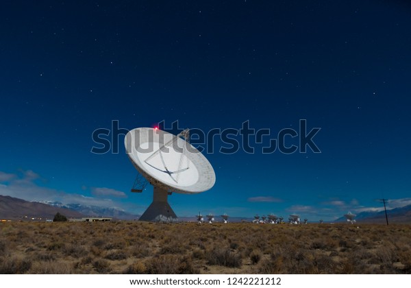 Radio Telescope Radar Dishes in Desert at night
Astrophotography 
