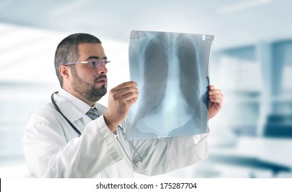 Radiologist man checking xray  