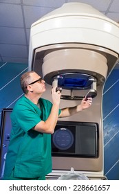 Radiotherapy Room - Radiation Therapy Machine - Male Radiologist