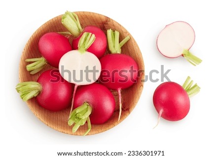 Radish in wooden bowl isolated on white background. Top view. Flat lay