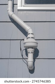 radon mitigation installed system outside the house