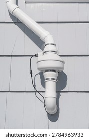 radon mitigation installed system outside the house