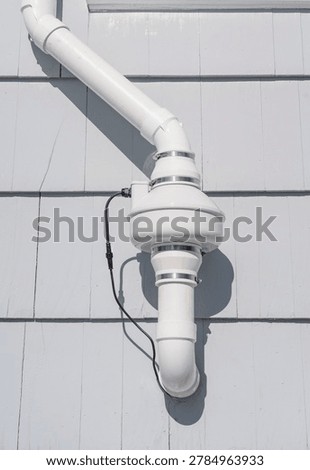 radon mitigation installed system outside the house