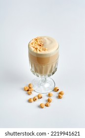 Raf Coffee With Nuts In A Glass, White Background, Product Photography