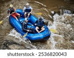 Raft, river and people in boat with rocks for fun adventure, holiday and outdoor vacation with friends. Extreme sports, travel and group in water for canoeing, kayaking and rowing activity in lake