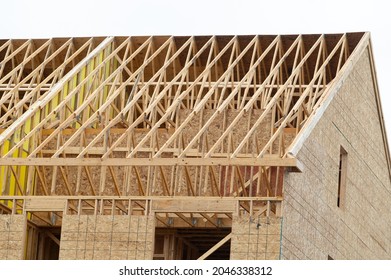 rafters of a new house under construction beam frame