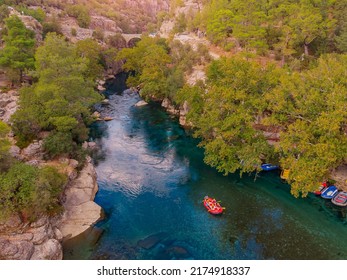 Rafting On Rapids On Red Boat Blue River From Koprulu Tazi Canyon, Manavgat Antalya Turkey Drone Aerial Top View.