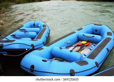 rafting race in blue boats