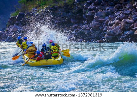 Rafting stunt while whitewater rafting Rishikesh India 