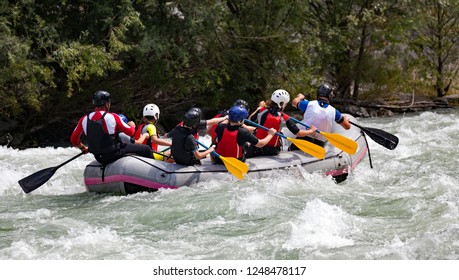 
Rafting Team In The Rapids