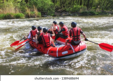  Rafting Team , Summer Extreme Water Sport.  Group Of People In A Rafting Boat, Beautiful Adrenaline Ride Down The Pacuare River,  Costa Rica.