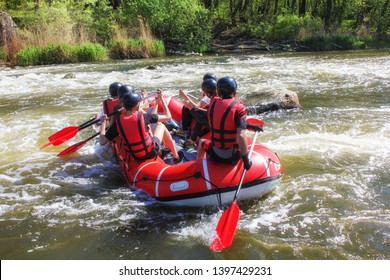  Rafting Team , Summer Extreme Water Sport.  Group Of People In A Rafting Boat, Beautiful Adrenaline Ride Down The Pacuare River,  Costa Rica.