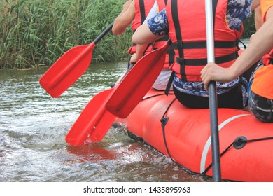 Rafting Team , Summer Extreme Water Sport.  Group Of People In A Rafting Boat, Beautiful Adrenaline Ride Down The River. Back View. POV